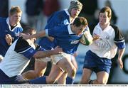 17 January 2004; Eoin McCormack, St. Mary's, in action against John O'Driscoll, left, and Pat McCarthy, Cork Constitution. AIB All Ireland League 2003-2004, Division 1, Cork Constitution v St. Mary's, Temple Hill, Cork. Picture credit; David Maher / SPORTSFILE *EDI*