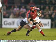 17 January 2004; Mike Mullins, Munster, in action against Henry Paul, Gloucester. Heineken European Cup 2003-2004, Round 4, Pool 5, Munster v Gloucester, Thomond Park, Limerick. Picture credit; Brendan Moran / SPORTSFILE *EDI*