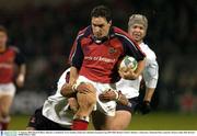 17 January 2004; David Wallace, Munster, is tackled by Terry Fanolua, Gloucester. Heineken European Cup 2003-2004, Round 4, Pool 5, Munster v Gloucester, Thomond Park, Limerick. Picture credit; Matt Browne / SPORTSFILE *EDI*