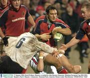 17 January 2004; David Wallace, Munster, is tackled by Jake Buxton, Gloucester. Heineken European Cup 2003-2004, Round 4, Pool 5, Munster v Gloucester, Thomond Park, Limerick. Picture credit; Matt Browne / SPORTSFILE *EDI*