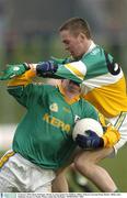 18 January 2004; Shane McKeigue, Meath, in action against Ger Rafferty, Offaly. O'Byrne Cup Semi-Final, Meath v Offaly, Pairc Tailteann, Navan, Co. Meath. Picture credit; Ray McManus / SPORTSFILE *EDI*