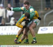 18 January 2004; Evan Kelly, Meath, in action against Scott Brady, Offaly. O'Byrne Cup Semi-Final, Meath v Offaly, Pairc Tailteann, Navan, Co. Meath. Picture credit; Brian Lawless / SPORTSFILE *EDI*