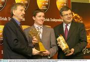 19 January 2004; Pictured at the presentation of the Powers Gold label / Irish Independent Racing Awards are P.J. Cunningham, Sports Editor of the Irish Independent, Barry Geraghty, Jockey, and Philippe Savinel, Chief Executive Irish Distillers. Four Seasons Hotel, Dublin. Picture credit; Ray McManus / SPORTSFILE