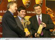 19 January 2004; Pictured at the presentation of the Powers Gold label / Irish Independent Racing Awards are (from l to r); P.J. Cunningham, Sports Editor of the Irish Independent, Ciaran Mcmanus, son of J.P. McManus who accepted the Owner's award on behalf of his father and Philippe Savinel, Chief Executive Irish Distillers. Four Seasons Hotel, Dublin. Picture credit; Ray McManus / SPORTSFILE