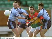 11 January 2004; Joe Byrne, Carlow, in action against Dublin's Ray Cosgrave and Jason Sherlock. O'Byrne Cup, Carlow v Dublin, Dr Cullen Park, Carlow. Picture credit; Ray McManus / SPORTSFILE *EDI*