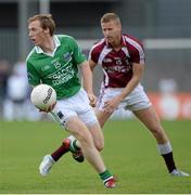 29 June 2013; Tommy McElroy, Fermanagh, in action against Denis Glennon, Westmeath. GAA Football All-Ireland Senior Championship, Round 1, Westmeath v Fermanagh, Cusack Park, Mullingar, Co. Westmeath. Picture credit: Brian Lawless / SPORTSFILE