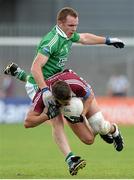 29 June 2013; Paul Sharry, Westmeath, in action against Martin McGrath, Fermanagh. GAA Football All-Ireland Senior Championship, Round 1, Westmeath v Fermanagh, Cusack Park, Mullingar, Co. Westmeath. Picture credit: Brian Lawless / SPORTSFILE