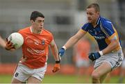 30 June 2013; Caolan Rafferty, Armagh, in action against James Stafford, Wicklow. GAA Football All-Ireland Senior Championship, Round 1, Armagh v Wicklow, Athletic Grounds, Armagh. Picture credit: Brendan Moran / SPORTSFILE