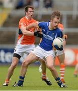 30 June 2013; James Stafford, Wicklow, in action against Tony Kernan, Armagh. GAA Football All-Ireland Senior Championship, Round 1, Armagh v Wicklow, Athletic Grounds, Armagh. Picture credit: Brendan Moran / SPORTSFILE