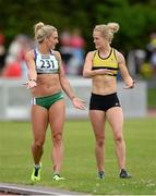 2 July 2013; Kelly Proper, left, and Ailis McSweeney in conversation as they leave the track after both were disqualified from the Women's 100m race at the 62nd Cork City Sports. Cork Institute of Technology, Bishopstown, Cork. Picture credit: Diarmuid Greene / SPORTSFILE