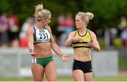 2 July 2013; Kelly Proper, left, and Ailis McSweeney in conversation as they leave the track after both were disqualified from the Women's 100m race at the 62nd Cork City Sports. Cork Institute of Technology, Bishopstown, Cork. Picture credit: Diarmuid Greene / SPORTSFILE