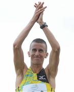 2 July 2013; Rob Heffernan applauds supporters after winning the Men's 3000m walk race in an Irish Senior and World M35 record time of 11.11.94 at the 62nd Cork City Sports. Cork Institute of Technology, Bishopstown, Cork. Picture credit: Diarmuid Greene / SPORTSFILE