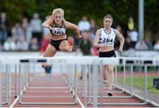 2 July 2013; Sarah Lavin, left, and Sandra Lawler compete in the Women's 100m Hurdles at the 62nd Cork City Sports. Cork Institute of Technology, Bishopstown, Cork. Picture credit: Diarmuid Greene / SPORTSFILE