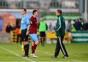 4 July 2013; Ryan Brennan, Drogheda United, remonstrates with Ognjen Valjic, the 4th official, after being sent off. UEFA Europa League, First Qualifying Round, First Leg, Drogheda United v Malmö FF, Tallaght Stadium, Tallaght, Dublin. Photo by Sportsfile