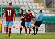 4 July 2013; Ryan Brennan, Drogheda United, is shown a second yellow card and subsequently sent off by referee Emir Aleckovic. UEFA Europa League, First Qualifying Round, First Leg, Drogheda United v Malmö FF, Tallaght Stadium, Tallaght, Dublin. Photo by Sportsfile