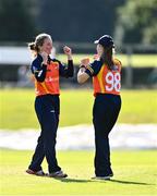 27 September 2020; Leah Paul of Scorchers, left, celebrates with Anna Kerrison after taking the wicket of Sarah Forbes of Typhoons during the Women's Super Series match between Scorchers and Typhoons at Malahide Cricket Club in Dublin. Photo by Sam Barnes/Sportsfile