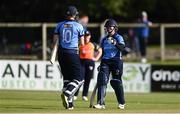 27 September 2020; Rachel Delaney of Typhoons, right, is congratulated by team-mate Rebecca Stokell after making her half century during the Women's Super Series match between Scorchers and Typhoons at Malahide Cricket Club in Dublin. Photo by Sam Barnes/Sportsfile