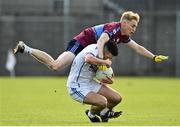 27 September 2020; Ronan O'Toole of St Loman's Mullingar is tackled by Stephen Quinn of Tyrrelspass during the Westmeath County Senior Football Championship Final match between Tyrrelspass and St Loman's Mullingar at TEG Cusack Park in Mullingar, Westmeath. Photo by Ramsey Cardy/Sportsfile