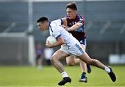 27 September 2020; Ronan O'Toole of St Loman's Mullingar in action against Jamie Corcoran of Tyrrelspass during the Westmeath County Senior Football Championship Final match between Tyrrelspass and St Loman's Mullingar at TEG Cusack Park in Mullingar, Westmeath. Photo by Ramsey Cardy/Sportsfile