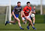 27 September 2020; Kian Moran of Ardee St Mary's in action against Conor Healy of Naomh Mairtin during the Louth County Senior Football Championship Final match between Naomh Mairtin and Ardee St Mary’s at Darver Louth Centre of Excellence in Louth. Photo by Ben McShane/Sportsfile