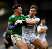 27 September 2020; John McGrath of Loughmore-Castleiney in action against Liam Ryan of Clonmel Commercials during the Tipperary County Senior Football Championship Final match between Clonmel Commercials and Loughmore-Castleiney at Semple Stadium in Thurles, Tipperary. Photo by Ray McManus/Sportsfile