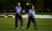27 September 2020; Orla Prendergast, left, and Laura Delany of Typhoons leave the field following the Women's Super Series match between Scorchers and Typhoons at Malahide Cricket Club in Dublin. Photo by Sam Barnes/Sportsfile