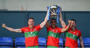 27 September 2020; Ballymun Kickhams captain James McCarthy, centre, lifts the Clerys Perpetual Cup alongside Paddy Small, left, and John Small after the Dublin County Senior 1 Football Championship Final match between Ballyboden St Enda's and Ballymun Kickhams at Parnell Park in Dublin. Photo by Piaras Ó Mídheach/Sportsfile