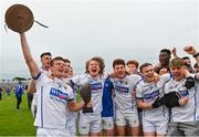 27 September 2020; St Loman's Mullingar captain John Heslin lifts the trophy with his team-mates following his side's victory in the Westmeath County Senior Football Championship Final match between Tyrrelspass and St Loman's Mullingar at TEG Cusack Park in Mullingar, Westmeath. Photo by Ramsey Cardy/Sportsfile