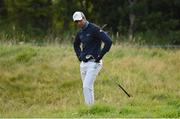 27 September 2020; Aaron Rai of England reacts after his third shot from the rough on the 18th green during day four of the Dubai Duty Free Irish Open Golf Championship at Galgorm Spa & Golf Resort in Ballymena, Antrim. Photo by Brendan Moran/Sportsfile