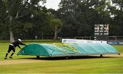 28 September 2020; The covers are wheeled out as rain delays play during the Test Triangle Inter-Provincial Series 50 over match between Leinster Lightning and North-West Warriors at Malahide Cricket in Dublin. Photo by Sam Barnes/Sportsfile