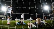 27 September 2020; Dundalk players, from left, Andy Boyle, goalkeeper Aaron McCarey and Chris Shields fail to stop Jack Byrne of Shamrock Rovers scoring their first goal during the SSE Airtricity League Premier Division match between Dundalk and Shamrock Rovers at Oriel Park in Dundalk, Louth. Photo by Stephen McCarthy/Sportsfile