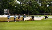 28 September 2020; Grounds staff remove the covers during the Test Triangle Inter-Provincial Series 50 over match between Leinster Lightning and North-West Warriors at Malahide Cricket in Dublin. Photo by Sam Barnes/Sportsfile