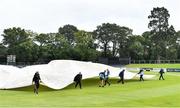 28 September 2020; Grounds staff remove the covers during the Test Triangle Inter-Provincial Series 50 over match between Leinster Lightning and North-West Warriors at Malahide Cricket in Dublin. Photo by Sam Barnes/Sportsfile