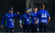 28 September 2020; North-West Warriors players including Will Smale, second from right and Craig Young, right, celebrate the wicket of Stephen Doheny of Leinster Lightning during the Test Triangle Inter-Provincial Series 50 over match between Leinster Lightning and North-West Warriors at Malahide Cricket in Dublin. Photo by Sam Barnes/Sportsfile