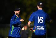 28 September 2020; Stuart Thompson of North West Warriors, left, celebrates with Conor Olphert after catching Stephen Doheny of Leinster Lightning during the Test Triangle Inter-Provincial Series 50 over match between Leinster Lightning and North-West Warriors at Malahide Cricket in Dublin. Photo by Sam Barnes/Sportsfile