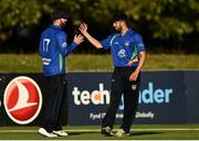 28 September 2020; Stuart Thompson of North West Warriors, left, celebrates with Varun Chopra after catching Simi Singh of Leinster Lightning during the Test Triangle Inter-Provincial Series 50 over match between Leinster Lightning and North-West Warriors at Malahide Cricket in Dublin. Photo by Sam Barnes/Sportsfile
