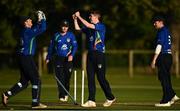 28 September 2020; Conor Olphert of North West Warriors, centre, celebrates with Will Smale, left, after bowling Greg Ford of Leinster Lightning during the Test Triangle Inter-Provincial Series 50 over match between Leinster Lightning and North-West Warriors at Malahide Cricket in Dublin. Photo by Sam Barnes/Sportsfile