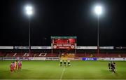 29 September 2020; Players observe a minute's silence for the late Michael Hayes of the FAI's Competitions Department prior to the SSE Airtricity League Premier Division match between Sligo Rovers and Derry City at The Showgrounds in Sligo. Photo by Stephen McCarthy/Sportsfile