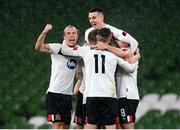 1 October 2020; Dundalk players, including Greg Sloggett, left, and Darragh Leahy celebrate followig the UEFA Europa League Play-off match between Dundalk and Ki Klaksvik at the Aviva Stadium in Dublin. Photo by Stephen McCarthy/Sportsfile