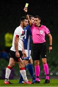 1 October 2020; Referee Maurizio Mariani issues a yellow card to Patrick Hoban of Dundalk during the UEFA Europa League Play-off match between Dundalk and Ki Klaksvik at the Aviva Stadium in Dublin. Photo by Ben McShane/Sportsfile