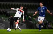 1 October 2020; Daniel Kelly of Dundalk shoots to score his side's third goal despite the attention of Heini Vatnsdal of Ki Klaksvik during the UEFA Europa League Play-off match between Dundalk and Ki Klaksvik at the Aviva Stadium in Dublin. Photo by Ben McShane/Sportsfile