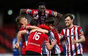 2 October 2020; Ibrahim Meite of Derry City, top, celebrates with team-mates after Conor Clifford, 16, scored their second goal, from a penalty, during the SSE Airtricity League Premier Division match between Derry City and Waterford at Ryan McBride Brandywell Stadium in Derry. Photo by Piaras Ó Mídheach/Sportsfile