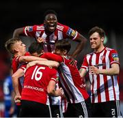 2 October 2020; Ibrahim Meite of Derry City, top, celebrates with team-mates after Conor Clifford, 16, scored their second goal, from a penalty, during the SSE Airtricity League Premier Division match between Derry City and Waterford at Ryan McBride Brandywell Stadium in Derry. Photo by Piaras Ó Mídheach/Sportsfile