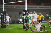 2 October 2020; Paolo Garbisi of Benetton shrugs off the challenge from Rob Herring of Ulster on his way to scoring his side's second try during the Guinness PRO14 match between Ulster and Benetton at the Kingspan Stadium in Belfast. Photo by David Fitzgerald/Sportsfile