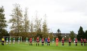 3 October 2020; Players and officials observe a minute's silence for the late Michael Hayes of the FAI's Competitions Department prior to the FAI Women's Senior Cup Quarter-Final match between Bohemians and Cork City at Oscar Traynor Centre in Coolock, Dublin. Photo by Stephen McCarthy/Sportsfile