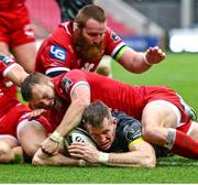 3 October 2020; Chris Farrell of Munster dives to score his side's second try during the Guinness PRO14 match between Scarlets and Munster at Parc y Scarlets in Llanelli, Wales. Photo by Darren Griffiths/Sportsfile