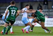 3 October 2020; Bundee Aki of Connacht is tackled by Adam Hastings, left, and Ali Price of Glasgow Warriors during the Guinness PRO14 match between Connacht and Glasgow Warriors at The Sportsground in Galway. Photo by Ramsey Cardy/Sportsfile
