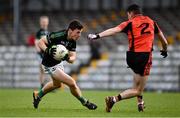 4 October 2020; Mark Cronin of Nemo Rangers in action against Micheal Mahoney of Duhallow during the Cork County Premier Senior Football Championship Semi-Final match between Nemo Rangers and Duhallow at Páirc Ui Rinn in Cork. Photo by Sam Barnes/Sportsfile