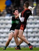 4 October 2020; Mark Cronin of Nemo Rangers in action against Patrick Doyle of Duhallow during the Cork County Premier Senior Football Championship Semi-Final match between Nemo Rangers and Duhallow at Páirc Ui Rinn in Cork. Photo by Sam Barnes/Sportsfile
