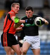 4 October 2020; Mark Cronin of Nemo Rangers in action against John McLoughlin of Duhallow during the Cork County Premier Senior Football Championship Semi-Final match between Nemo Rangers and Duhallow at Páirc Ui Rinn in Cork. Photo by Sam Barnes/Sportsfile